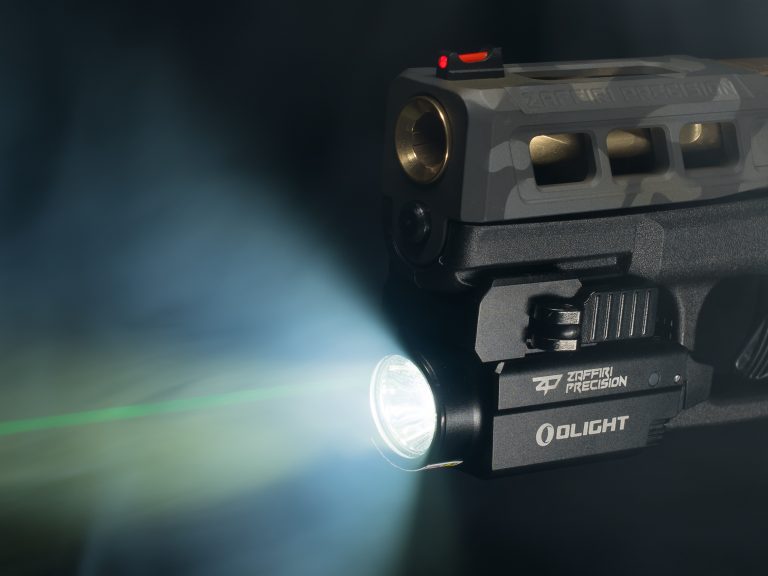 Zaffiri Precision custom Glock pistol upper with branded OLIGHT Baldr S weapon mounted light activated, emitting 800 lumens white light and green laser for tactical low-light performance – free with select uppers in July 2025 promo