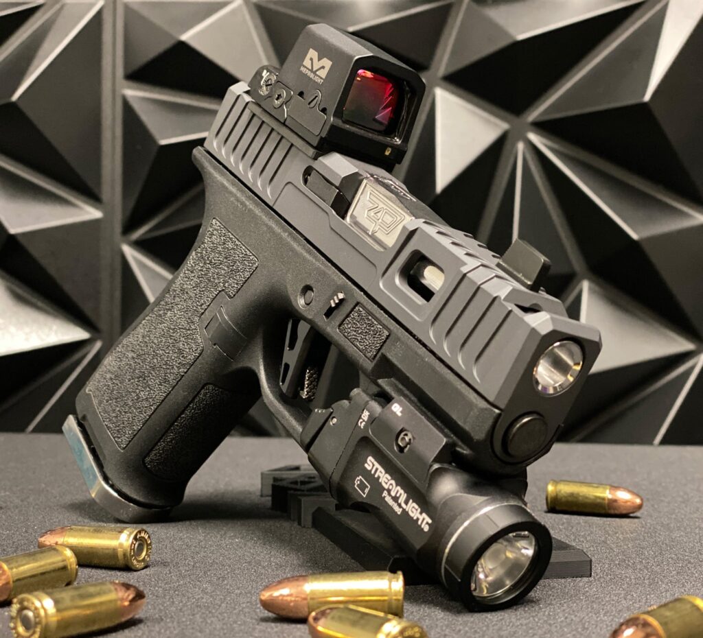 Glock 43x pictured with the Zaffiri Precision IBS (integrated blow-hole system) custom Glock slide for Glock 43x