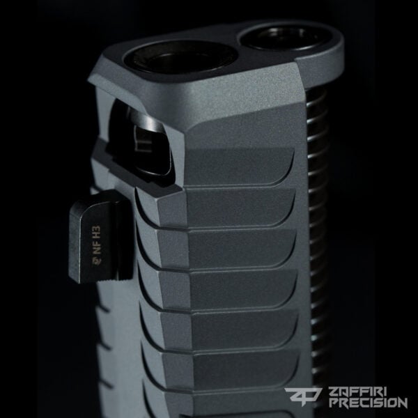 Glock 17 IBS (Integrated Blowhole System) Slide by Zaffiri Precision seen here on a standard OEM Glock 17. This Custom Glock Slide offers extreme recoil impulse control and superior target acquisition